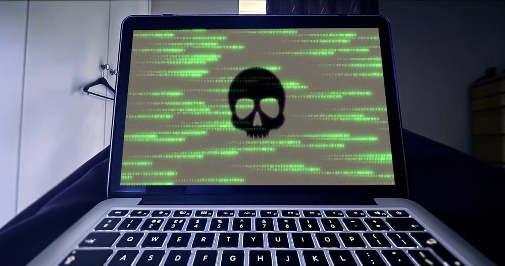 laptop screen with skull indicating data loss