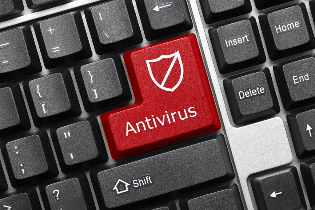 A typical black computer keyboard with the enter key replaced with a red Antivirus key.