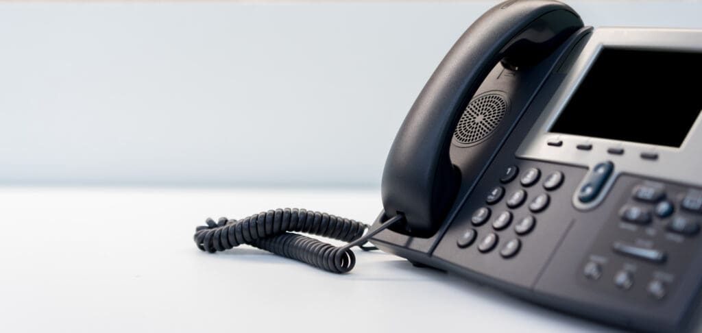 a voip phone on a desk